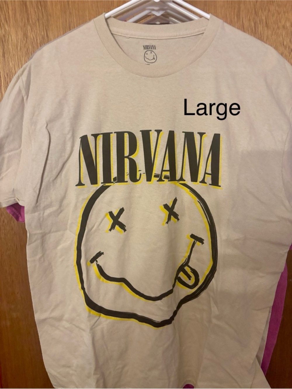 NIRVANA Beige Tee with Black and Yellow Smiley Graphic